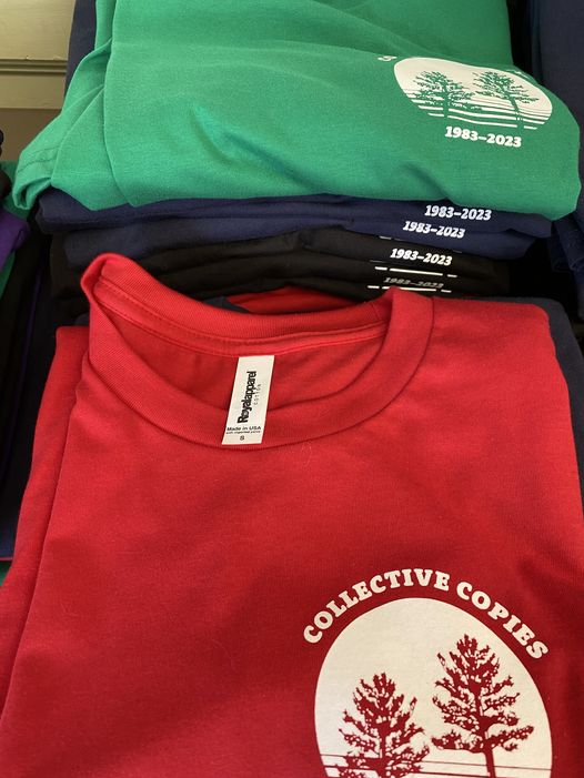 Collective Copies 40th Anniversary t-shirts made by Union CO-OP Printer, WORX Printing Cooperative. Red, Green, and Navy t-shirts shown.