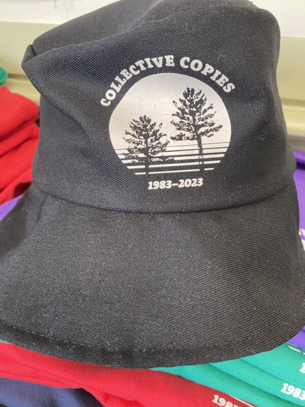 Collective Copies 40th anniversary bucket hat with Twin Pines logo