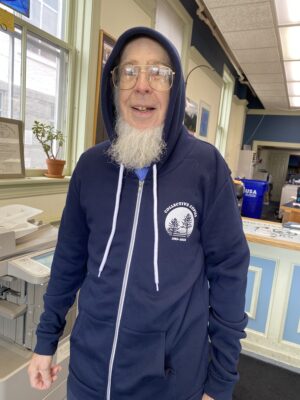Collective Copies zipper hoodie, Navy blue. Shows Collective Copies' cooperative Twin Pines logo in white.